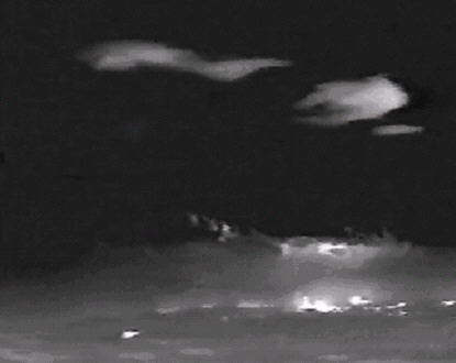 Photo taken from video footage from an Australian Government aircraft fitted with a FLIR pod. 148.79 -35.73 looking SSW atabout 15:00 AEDST 26th January, 2003.