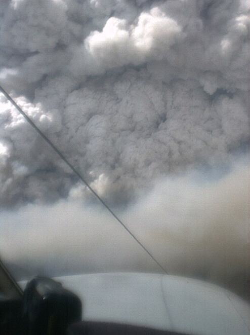 Photo: Target Air Services Pty Ltd. Over Uriarra area. 148.7 -35.4 looking E. at about 15:30 AEDST 18th January 2003.