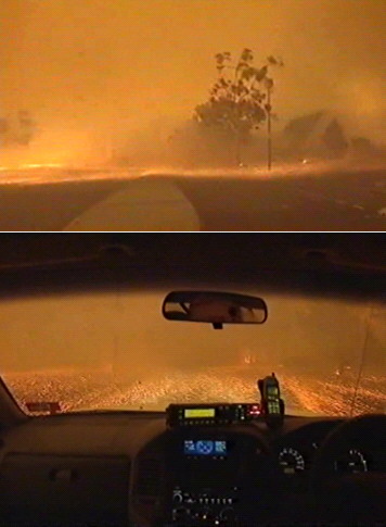 Photo from WIN TV News footage. 149.03 35.33 looking N at about 16:00 AEDST, 18th January 2003.